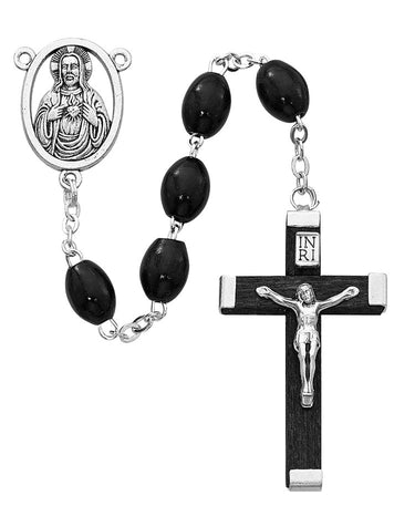 6x8mm black wood rosary with silver oxidized center piece and matching wood crucifix on a display card