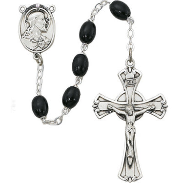6x8mm black wood rosary with sterling silver crucifix and center piece displayed against a white background