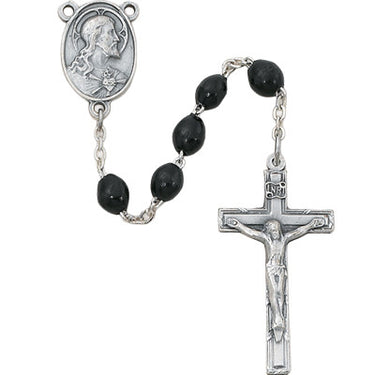 4x6mm black wood rosary with sterling silver crucifix and center piece displayed against a white background