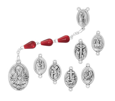 Red teardrop bead Seven Sorrows Chaplet 23 inches long with silver oxidized metal parts and carded packaging