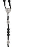 Black wood St. Benedict cord rosary with silver oxidized crucifix and St. Benedict center piece, made in Italy, shown in plastic gift box