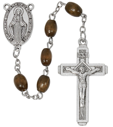 Brown wood bead rosary with silver oxidized crucifix and center medal displayed on retail card