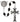 Close-up of silver oxidized St. Benedict crucifix and center medal on black wood bead rosary