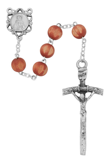 7mm light brown wood carved rosary made in Italy with five decades and carved Our Father beads displayed against a white background