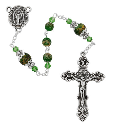 Green marbeline glass bead five-decade rosary with antique gold-tone crucifix and center medal displayed on a white background