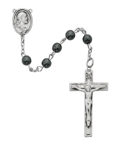 19-inch genuine hematite rosary with pewter centerpiece and pewter crucifix displayed on a flat surface showing full bead layout