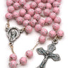 Pink children's Catholic rosary for girls with 5mm pink beads decorated with silver stars, pewter crucifix and center, in gift box