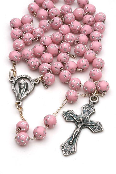 Pink children's Catholic rosary for girls with 5mm pink beads decorated with silver stars, pewter crucifix and center, in gift box