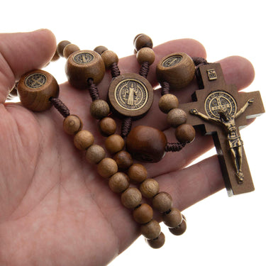 Men's large St. Benedict brown wood rosary — full view of 10mm beads on cord with crucifix and medal