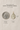 Saint Dymphna Gold Filled medal with size comparison to a U.S. quarter on a beige background