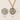Saint Dymphina Gold Filled medal necklace with gold plated chain on a textured beige background