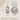 Sterling Silver Saint Dymphna pendant with measurements and description on a neutral background