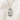 Sterling Silver pendant necklace with 'Saint Dymphna' on a beige fabric background