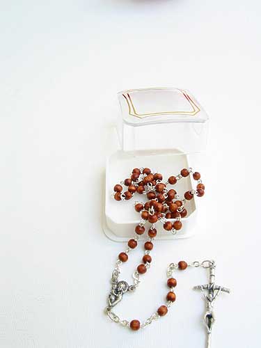 Light brown wood Catholic rosary with 3mm beads, traditional five-decade design with crucifix and center medal