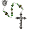 Green marbeline glass bead five-decade rosary with antique gold-tone crucifix and center medal displayed on a white background