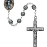 7mm hematite St. Joan of Arc rosary with pewter crucifix and center medal displayed on a flat surface