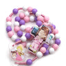 Pink and purple Catholic child rosary beads on cord with acrylic crucifix for girls first communion gift