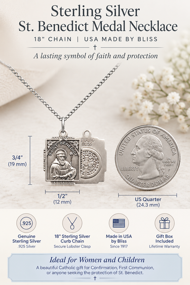 Sterling silver St. Benedict patron saint medal necklace with 18-inch .925 sterling silver chain beside a US quarter for size comparison. Medium 3/4 x 1/2 inch Catholic medal handmade in the USA by Bliss Manufacturing for women and children.