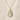 Gold Filled St Dymphna medal necklace with a religious pendant on a beige fabric background