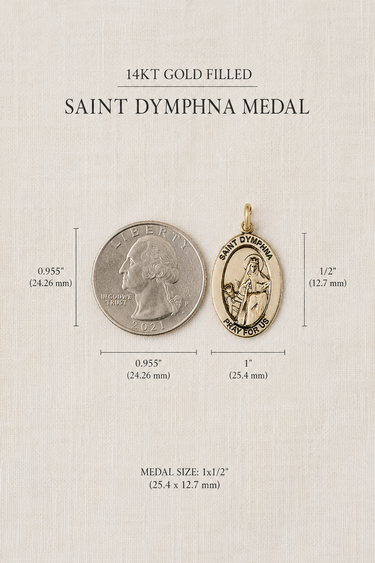 Gold Filled Saint Dymphna medal with size measurements on a beige background