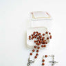 Light brown wood Catholic rosary with 3mm beads, traditional five-decade design with crucifix and center medal