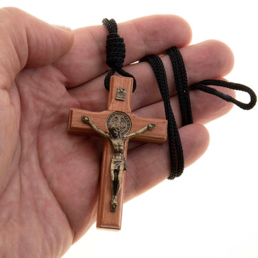 3 inch brown wooden St. Benedict crucifix necklace with black rope cord, Christ corpus and medal reverse